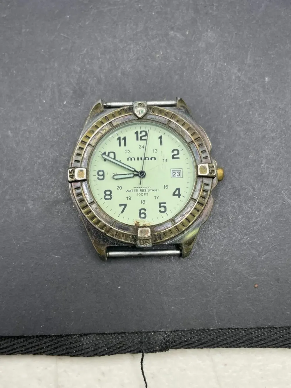 Vintage Milan Quartz Watch Men's Bronze Tone Fixed Bezel MLN810 37MM 100ft